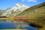 RhB Regio-Express 1642 von Tirano nach St.Moritz am 25.08.2007 am Lago Nero zwischen Ospizio Bernina und Bernina Lagalb mit Bernina-Triebwagen ABe 4/4 I 30 - B 2456 - B 2451 - B 2308 - B 2092 - B