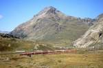 RhB Bernina-Express TRENO ROSSO 972 von Tirano nach St.Moritz am 25.08.2007 bei Alp Bondo zwischen Ospizio Bernina und Lagalb mit Triebwagen ABe 4/4 II 41 - ABe 4/4 II 42 - Bp 2626 - Bp 2506 - Bp 2522 - Bps 2514 - Api 1306 - Api 1302
