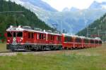 RhB - Bernina-Express 951 von Chur nach Tirano am 17.08.2008 zwische Surovas und Morteratsch mit Triebwagen ABe 4/4 III 55 - ABe 4/4 III 52 - Api 1305 - Api 1303 - Bps 2512 - Bp 2502 - Bp 2506 - Bp