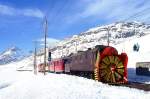 RhB - GRAUBNDEN TOURS Dampfschneeschleuder-Dienstextrazug 9472 von Ospizio Bernina nach Pontresina am 31.01.1998 Ausfahrt Ospizio Bernina mit Triebwagen ABe 4/4 II 41 - B 2092 - ABe 4/4 II 49 - Xrot d 9213 - Hinweis: Rckansicht
