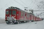 Die ABe 4/4 II 49 und 41 stehen mit dem verschneiten R 1633 St. Moritz - Tirano in der Alp Grm, aufgenommen am 14.12.08.