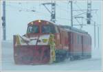 ABe 4/4 II 48 mit xRot 9219 wartet in Ospizio Bernina bis die Strecke wieder frei ist. (17.02.2009)