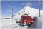 ABe 4/4 48 mit R1617 in Bernina Lagalb vor dem Piz Albris 3165m.