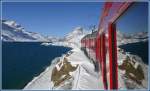 R1648 mit ABe 4/4 III 52  Brusio  und 56  Corviglia  windet sich dem Lago Bianco (der momentan allerdings noch blau ist) entlang Richtung Ospizio Bernina mit 2253m der hchste Punkt der