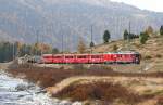 RhB - Regionalzug 1635 von St.Moritz nach Tirano am 13.10.2008 zwischen Morteratsch und Bernina Suot mit Triebwagen ABe 4/4 II 46 - Zweikraftlok Gem 4/4 802 - B - B - B - B - AB - BD 2475 - Za - Za
