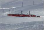 Der planmssige R1621 mit ABe 4/4 II 45 und 47 nach Poschiavo fhrt an diesem Morgen einen Spurpflug mit sich. (12.01.2010)