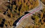 RhB - Bernina-Express 974 von Tirano nach St.Moritz am 12.10.2008 oberhalb Alp Grm Ausfahrt Gelerie Grm mit ABe 4/4 III 51 - ABe 4/4 III 56 - Bp - Bp - Bp - Bps - Ap - Ap.