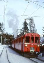 RhB Foto-Dampfzug fr GRAUBNDEN TOURS 3417 von Pontresina nach Ospizio Bernina am 21.02.1998 in Surova mit Oldtimer-Triebwagenvorspann ABe 4/4I 31 - ABe 4/4I 34 und mit Dampflok G 3/4 1 - B 2060 - D 4052I - A 1102 - Xk 9398. Hinweis: Dies ist die zweite Fotofahrt mit Dampf auf Bernina seit Bahnbau.
