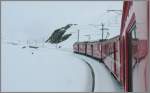 R1640mit ABe 4/4 II 44 und 49 ist am Lago Bianco auf dem Berninapass unterwegs.