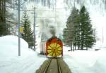 RhB DAMPFSCHNEESCHLEUDER-Extrazug fr GRAUBNDEN TOURS 4448 von Cavaglia nach Alp Grm am 01.03.1997 kurz nach Cavaglia mit Dampfschneeschleuder X rot d 9213 - Triebwagen ABe 4/4II 48. Hinweis: Aufnahmen vom auf Sicht vorausfahrenden Rumzug!
