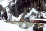 RhB DAMPFSCHNEESCHLEUDER-Extrazug fr GRAUBNDEN TOURS 4448 von Cavaglia nach Alp Grm am 01.03.1997 auf Val Pila-Viadukt mit Dampfschneeschleuder X rot d 9213 - Triebwagen ABe 4/4II 48. Hinweis: Aufnahmen vom auf Sicht vorausfahrenden Rumzug!
