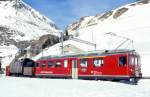 RhB DAMPFSCHNEESCHLEUDER-Extrazug fr GRAUBNDEN TOURS 9448 von Cavaglia nach Alp Grm am 31.01.1998 Einfahrt Alp Grm mit Dampfschneeschleuder X rot d 9213 - Triebwagen ABe 4/4II 41. Hinweis: Rckansicht
