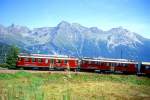 RhB REGIONALZUG 464 von Tirano nach St.Moritz am 26.08.2000 Einfahrt Alp Grm mit Triebwagen ABe 4/4II 44 - ABe 4/4II 41 - 4x B - AB - B - A)
