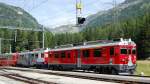 Bernina Express mit den Triebwagen ABe 4/4 Nr 56 und Nr. 54  durchfhrt die Station Cavaglia. (Aufnahme 10.07.2010) 