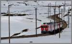R1629 Mit ABe 4/4 III 54 und 55 zwischen Bernina Lagalb und der unteren Berninabachbrcke. (18.04.2012)