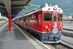 ABe 4/4 III 54 an der Spitze des R nach St. Moritz in Tirano, 26.08.2013.