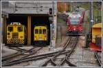 Tm98 und ehemaliger ABe 4/4 I, jetzt 9922 strecken ihre Nase ins Freie und der R1613 aus St.Moritz erreicht Poschiavo.