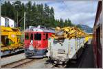 ABe 4/4 III 52  Brusio  und Altschotterwagen in Pontresina. (21.08.2014)