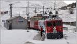 In Bernina Suot wartet bereits R1636 mit den beiden ABe 4/4 III 55  Diavolezza  und 51  Poschiavo . (23.10.2014)