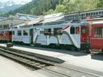 Bernina Triebwagen ABe 4/4 Nr.51 mit dem  UNESCO  Label am 10.05.07 in Poschiavo.