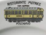  Nostalgie  Triebwagen ABe 4/4 auf den Tellern in einem Restaurant in Poschiavo.10.05.07