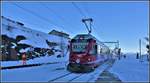 R1652 mit ABe 8/12 3514 nach St,Moritz fährt in Alp Grüm ein. (11.12.2018)