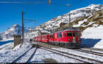 RhB ABe 4/4 III 54 / Ospizio Bernina, 13. Februar 2022<br>
Extrazug St. Moritz - Tirano