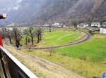 RhB Berninabahn__Der Kreisviadukt von Brusio. Noch ca. 5 km bis zur italienischen Grenze. Regen statt Schnee...__26-02-2024