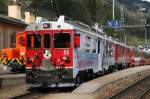 Bernina-Express 953 von Chur nach Tirano im Bahnhof von Poschiavo am 4.