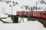 ABe 4/4 II 49 & 47 auf der oberen Berninabachbrcke zwischen Ospizio Bernina und Bernina Lagalb mit Regionalzug 1654 am 4. Mai 2008.