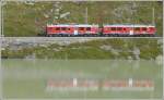 Regio 825 St.Moritz bis Ospizio Bernina mit ABe 4/4 III 56  Corviglia  und 53  Tirano  am Lago Bianco. (10.09.2008)