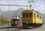 R1656 mit ABe 4/4 III 53  Tirano  und 56  Corviglia  berholen in Alp Grm den ABe 4/4 I 34. (10.09.2008)