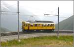 ABe 4/4 I 34 beim Umfahren in Alp Grm. Es liegt noch immer Saharastaub in der Luft. (10.09.2008)