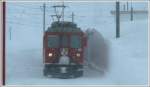 In Bernina Lagalp begegnet uns planmssig BerninaExpress 973 mit ABe 4/4 II 49 an der Spitze.