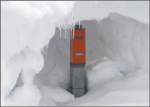 Ein ortsunkundiger Arbeiter htte diesen Zugabfertigungskasten wohl nie gefunden in der drei Meter hohen Schneemauer in Ospizio Bernina.