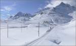Wunderbare Winterlandschaft auf der Alp Bondo mit Piz Trovat, Piz d`Arlas und Piz Cambrena. Wer genau hinschaut entdeckt auch die zwei unbekannten Schneeschuhlufer, die mir etwas vorgespurt haben hinauf zum Berninapass. (10.03.2009)