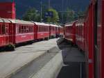 ABe 4/4 III Nr. 54 fhrt mit ihrem Zug im Bahnhof Poschiavo direkt zur Gem 4/4 801, 11. Sept. 2009, 14:16
