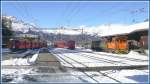 R1637 aus St.Moritz und R1937 aus Scuol-Tarasp fahren in Pontresina ein.