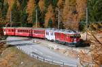 RhB - Regionalzug 1641 von St.Moritz nach Tirano am 13.10.2008 oberhalb Montebello mit ABe 4/4 III 56 - ABe 4/4 II 51 - B - B - BD - AB 1541
