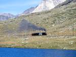 RhB Dampf-Extrazug fr GRUBNDEN TOURS 3456 von km 21,700 nach Ospizio Bernina am 26.08.2000 am Lago Nero mit Dampflok G 3/4 1 - Xk 9398 - B 2060 C 2012.