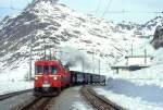 RhB Foto-Dampfzug fr GRAUBNDEN TOURS 3417 von Pontresina nach Ospizio Bernina am 21.02.1998 in Lagalb mit Oldtimer-Triebwagenvorspann ABe 4/4I 31 - ABe 4/4I 34 und mit Dampflok G 3/4 1 - B 2060 - D 4052I - A 1102 - Xk 9398. Hinweis: Dies ist die zweite Fotofahrt mit Dampf auf Bernina seit Bahnbau.
