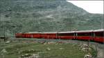 Gem 4/4 und Abe 4/4 II ziehen den ursprnglichen BerninaExpress zwischen Bernina Lagalb und Ospizio Bernina bergwrts. (ca 1995)