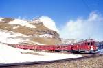 RhB GmP 4435 von St.Moritz nach Tirano am 09.03.1998 Ausfahrt Alp Grm mit Triebwagen ABe 4/4II 44 - ABe 4/4II 47 - BD 2474 - AB 1545 - Rpw 8291 - Rpw 8279 - Gb 5019.