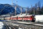 RhB REGIONALZUG 434 von Tirano nach St.Moritz am 28.02.1998 in Pontresina mit Triebwagen ABe 4/4II 46 - ABe 4/4II 47 - B 2454 - DZ 4036.