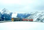 RhB DAMPFSCHNEESCHLEUDER-Extrazug fr GRAUBNDEN TOURS 4448 von Cavaglia nach Alp Grm am 01.03.1997 bei Alp Grm mit Dampfschneeschleuder X rot d 9213 - Triebwagen ABe 4/4II 48.