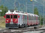 RhB - Triebwagen Abe 4/4 51 mit ABe 4/4 52 bei der einfahrt im Bahnhof Pontresina am 14.09.2010