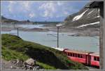 Durchblick in Ospzio Bernina 2253m /M. Richtung Sden ber den Lago Bianco. (15.06.2011)