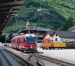 RhB ABe 8/12 3506  Anne von Planta  am 30. Juni 2011 neben Tm 2/2 22 in Tirano.
