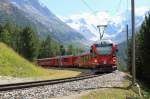 Regio nach Tirano am 17.08.11 in der  Montebello  Kurve.Im Hintergrund der Morteratsch Gletscher