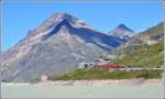 R1629 nach Tirano hat soeben die hchstgelegene Station der RhB Ospizio Bernina 2253m verlassen.